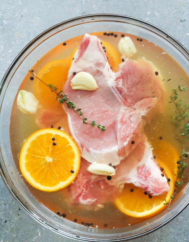 Pork Chops Submerged in a Brine Solution