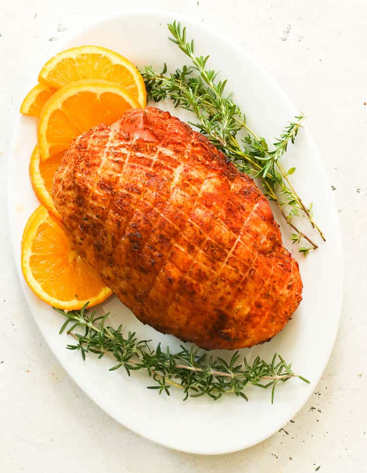 Smoked turkey breast with orange slices