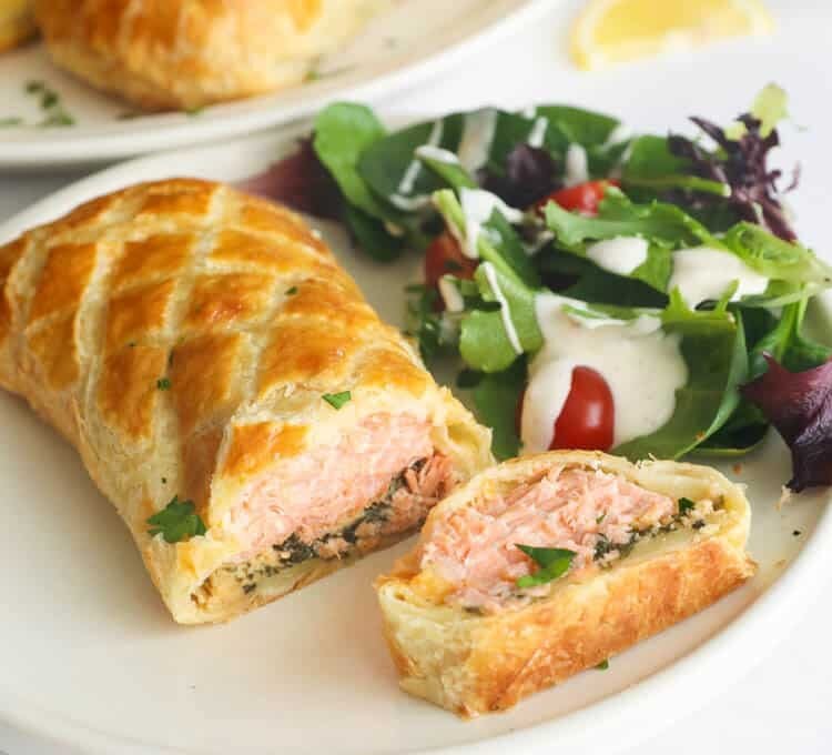 Easy and delicious Salmon Wellington sliced and ready to enjoy