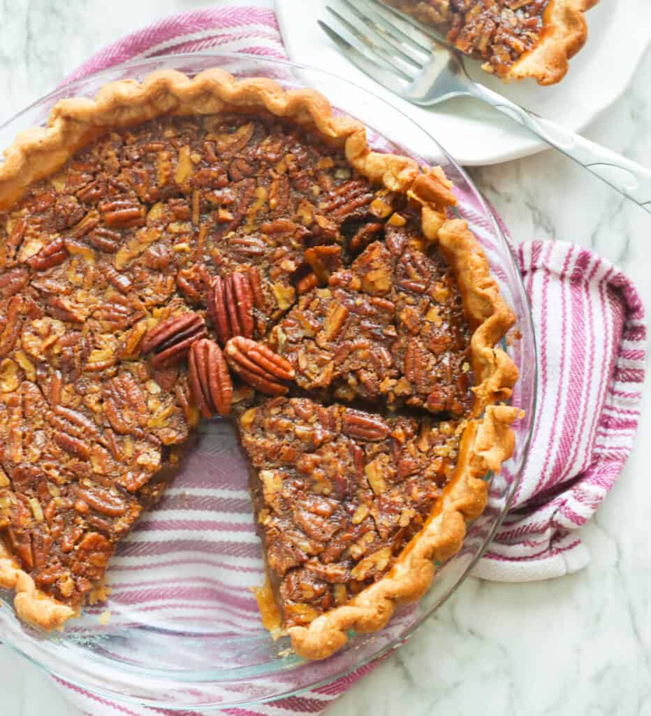 Bourbon Pecan Pie with a slice served