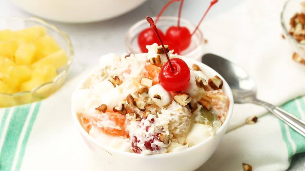 Ambrosia Salad topped with Cherry