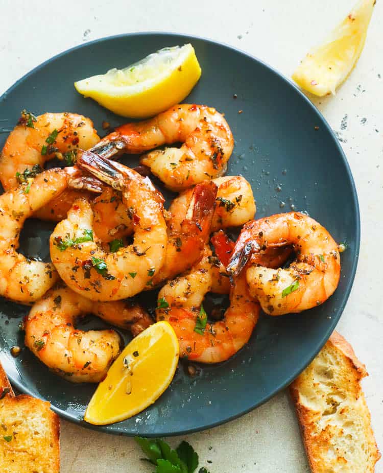 A Plate of Smoked Shrimp with Lemon Wedges