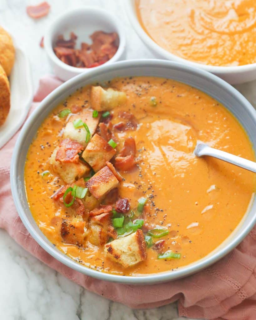 Sweet Potato Soup Topped with Croutons and Chopped Bacon