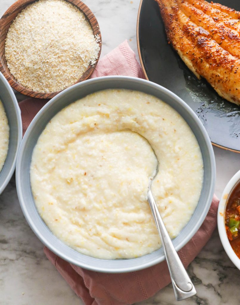 A bowl of cheesy ground corn porridge