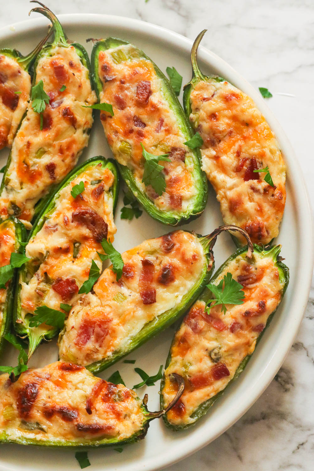Freshly Baked Jalapeno Poppers on a white plate
