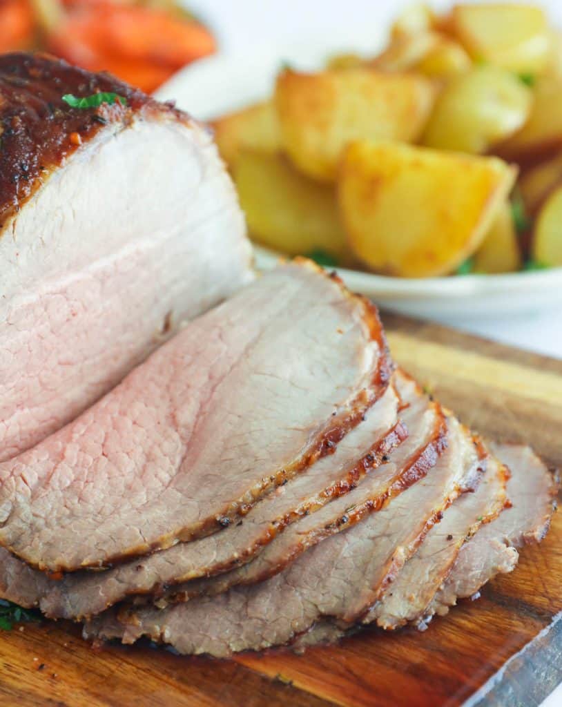 Side Shot of Roast Beef on a Chopping Board