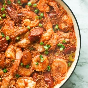 a pan of freshly cooked jambalaya with shrimp, sausages, and chicken