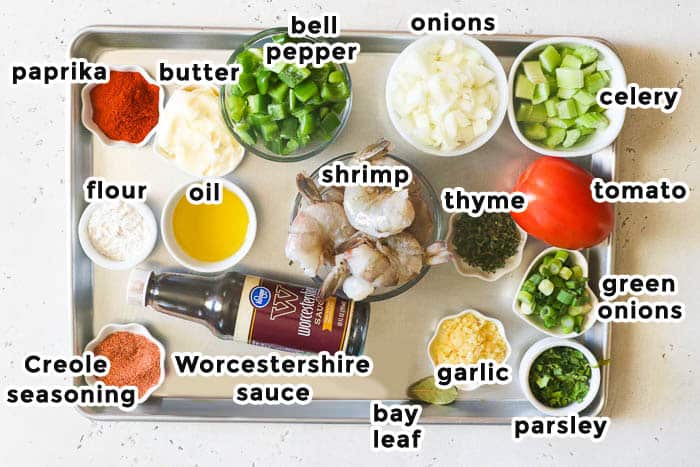 shrimp etouffee ingredients on a sheet pan