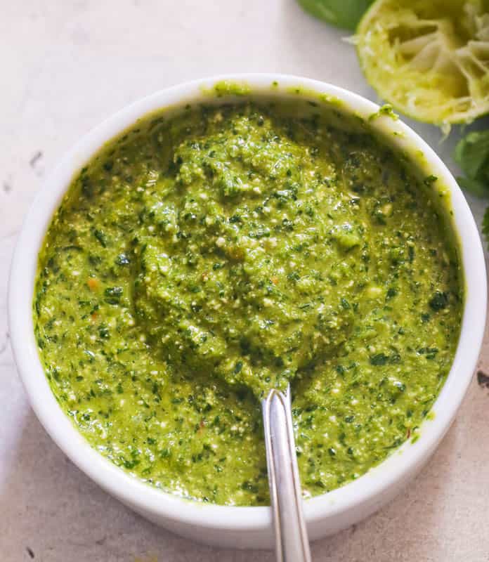 A bowl of green sauce