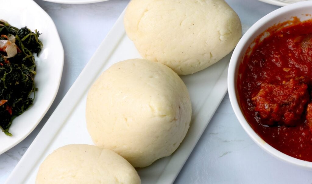 Satisfying Ugali (corn fufu) with traditional African dishes
