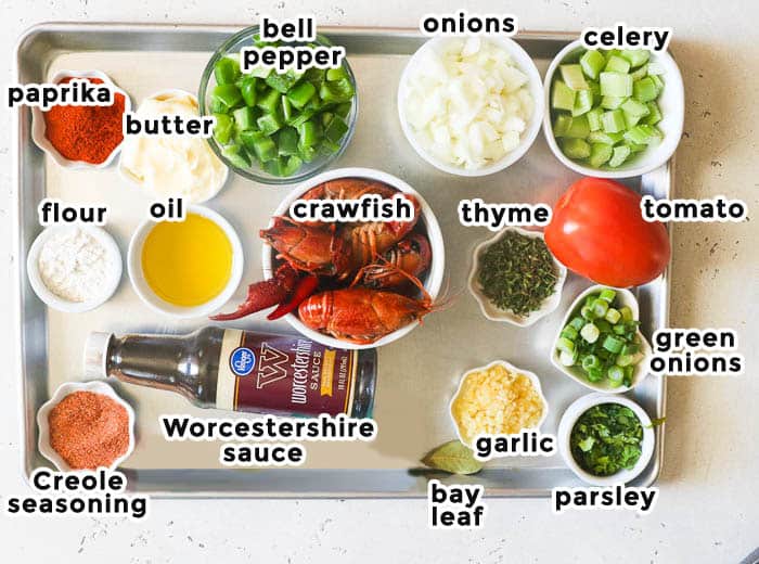 crawfish etouffee ingredients on a sheet pan