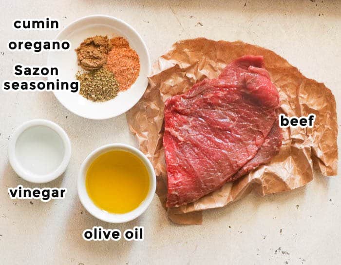 steak and seasoning ingredients for jibarito steak sandwich