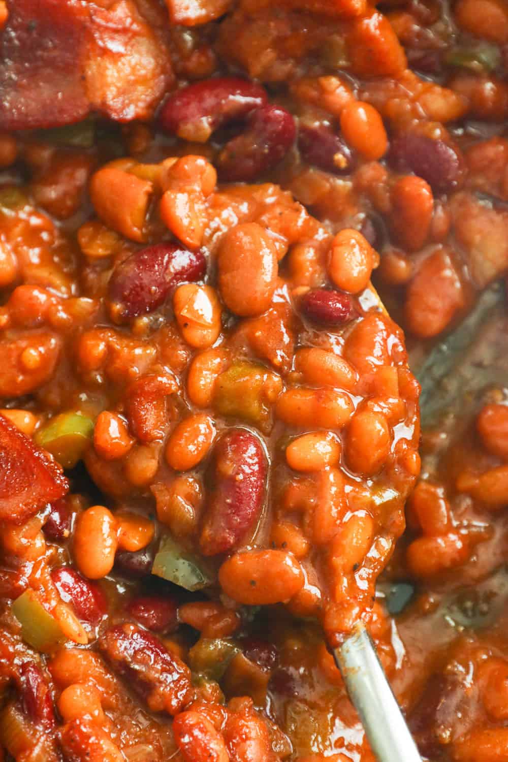 closeup shot of saucy southern baked beans