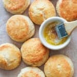 Brushing butter biscuits with extra melted butter