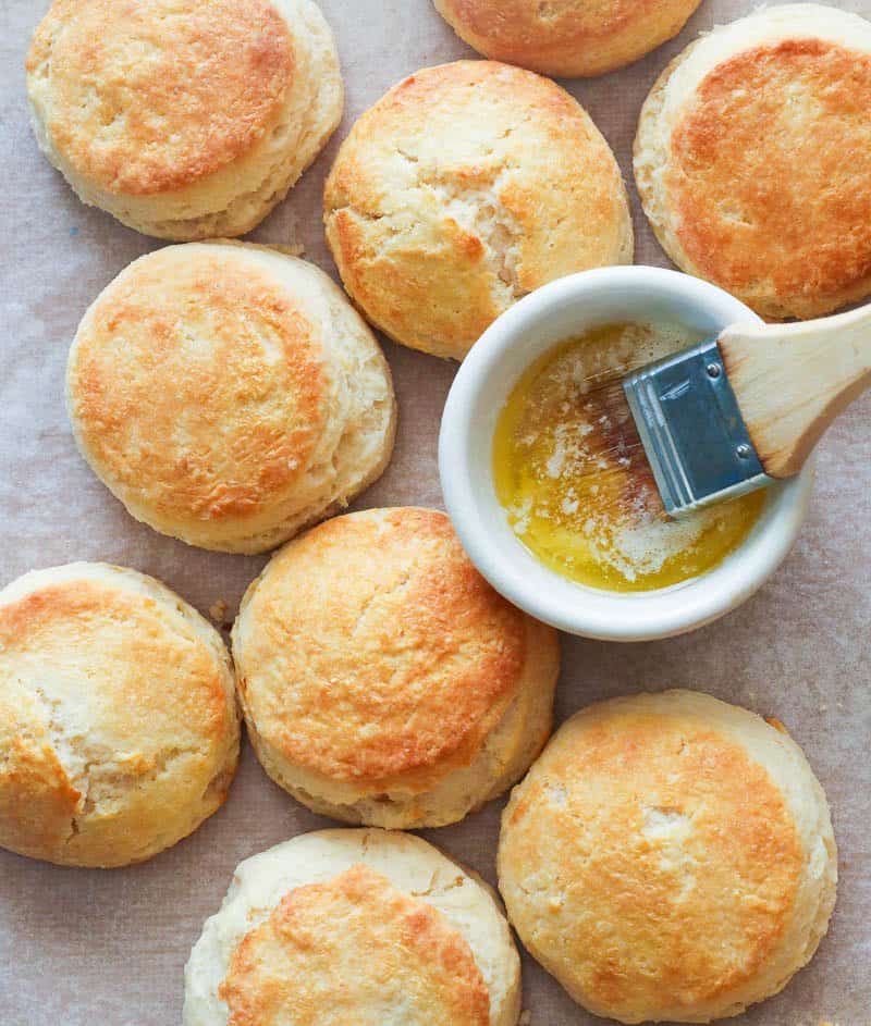 Freshly baked butter biscuits with extra melted butter to brush on