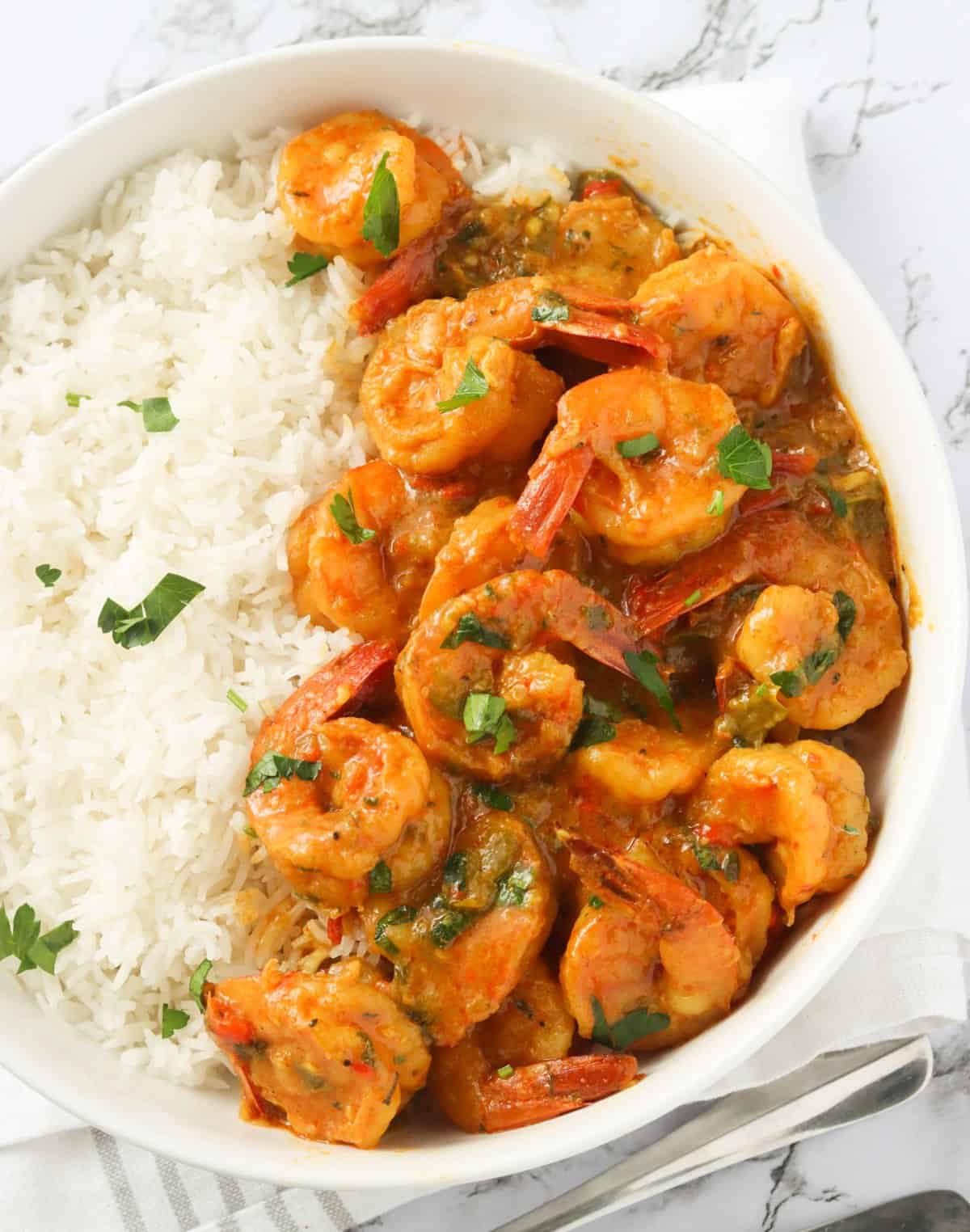 A Bowl of Jamaican Curry Shrimp Served with Rice