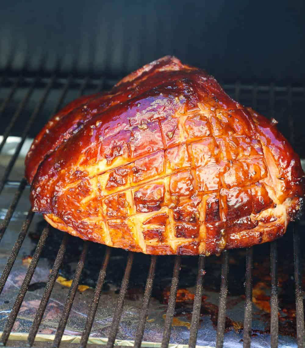 Scored Smoked Ham in a Smoker