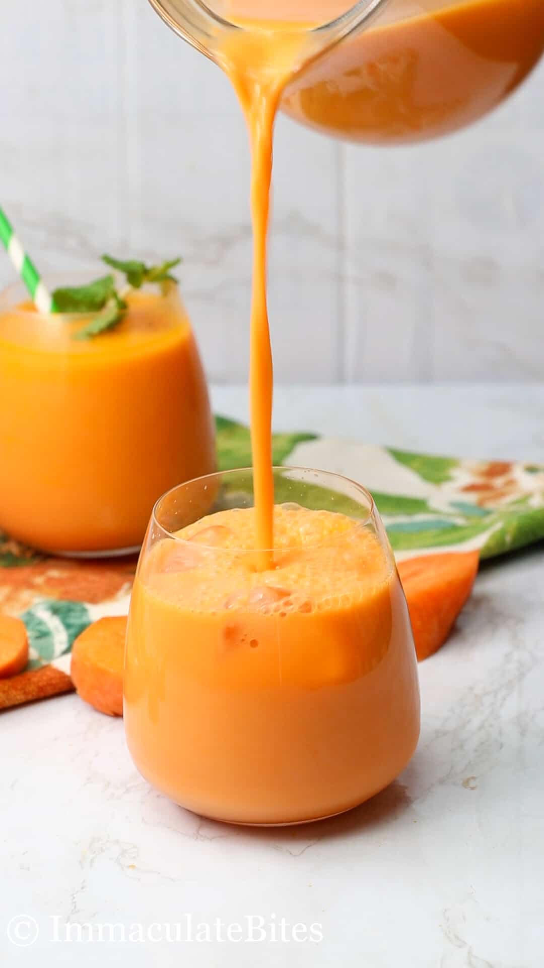 Pouring a Glass of Jamaican Carrot Juice