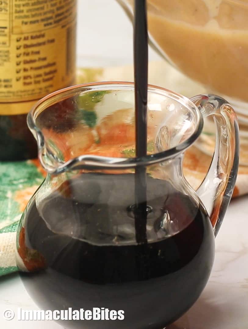 Browning sauce being poured into a pitcher