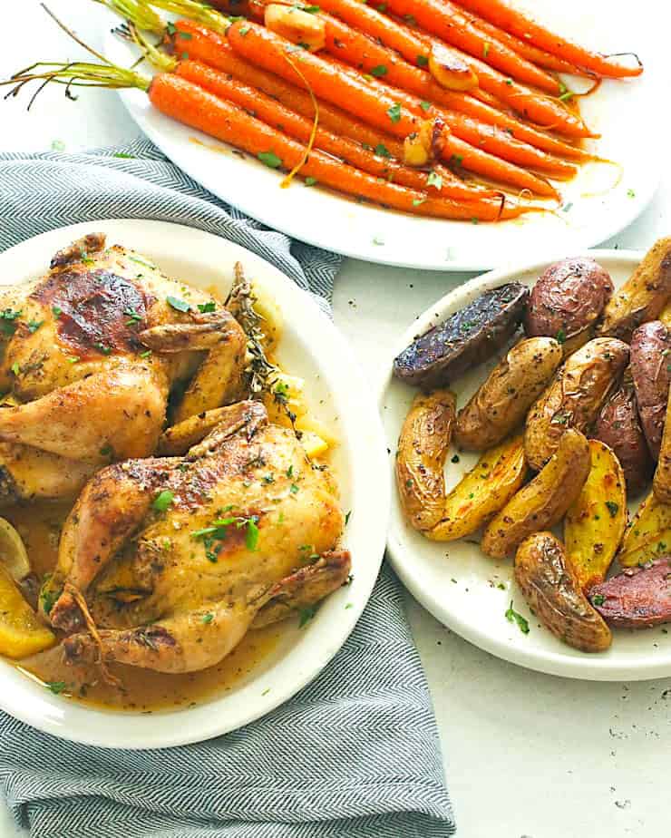 Roasted Cornish hen with beautiful whole carrots and fingerling potatoes