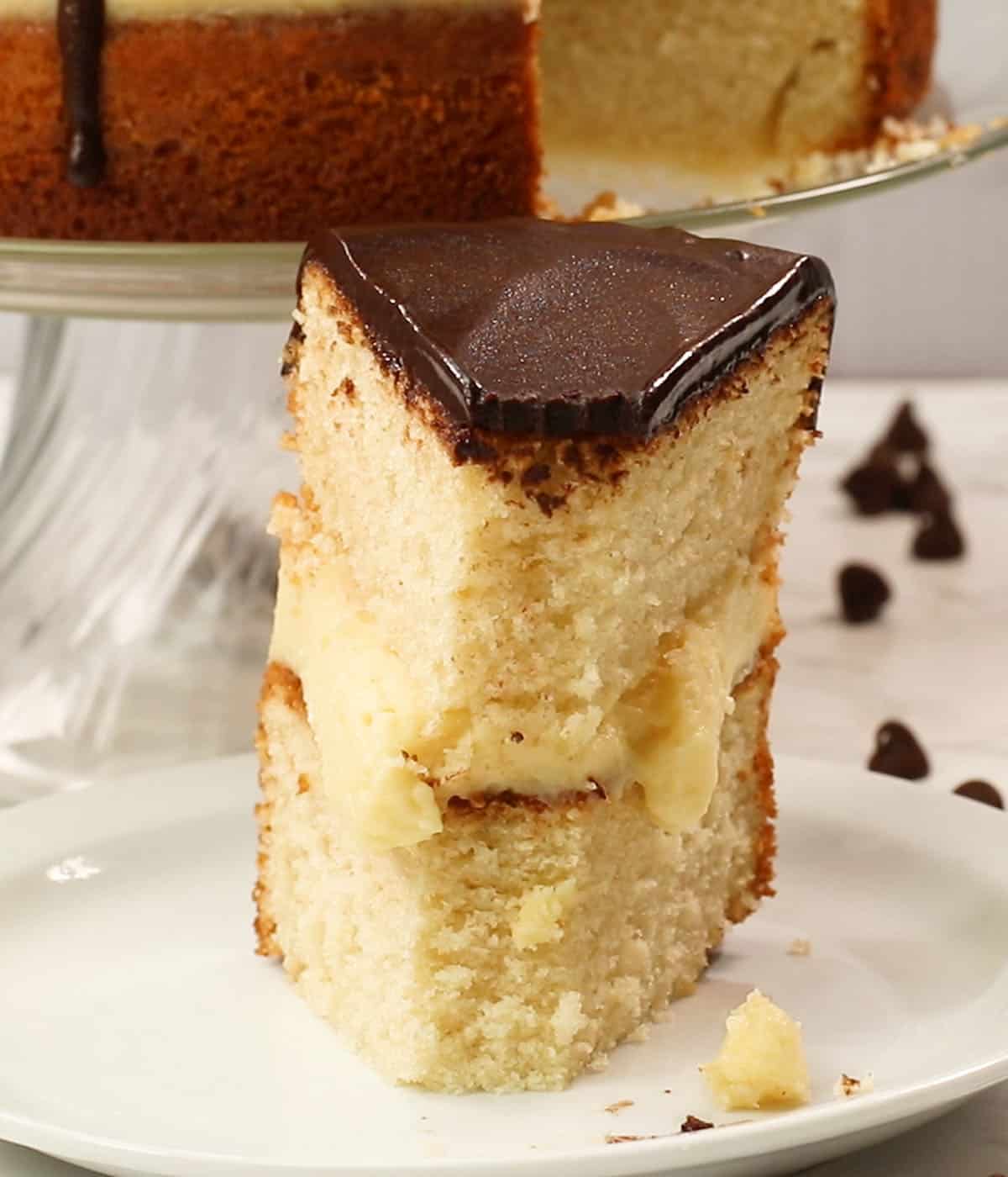 a front shot of a slice of Boston cream pie 