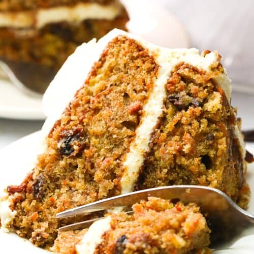Forking into a decadent slice of carrot cake with crushed pineapple.