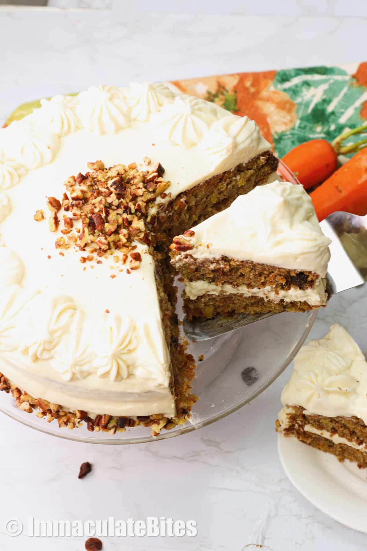 Top view of carrot pineapple cake with slice being removed