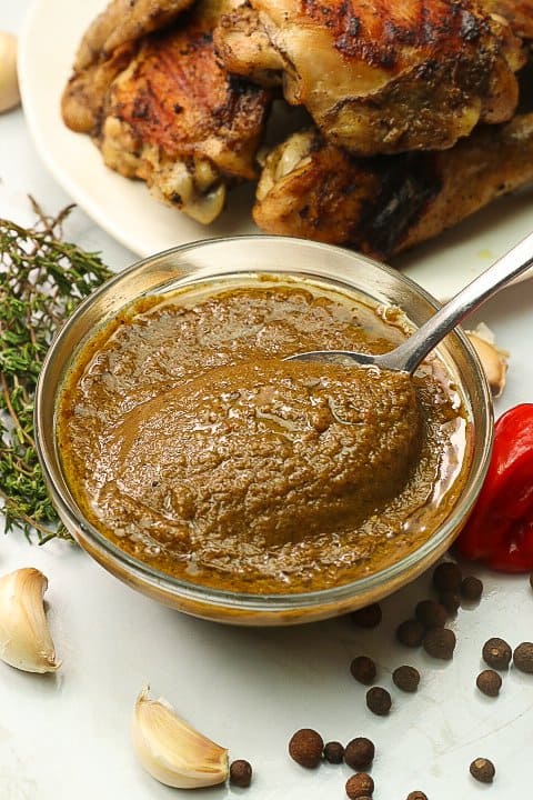 Jamaican Jerk Sauce with roasted chicken in the background