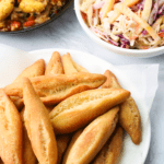 Jamaican Fried Dumplings (festivals) with mango coleslaw