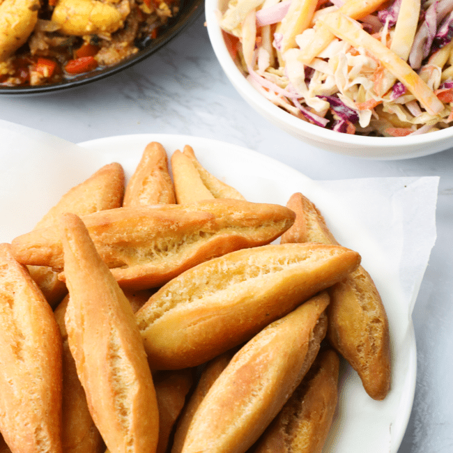 Jamaican Fried Dumplings (festivals) with mango coleslaw