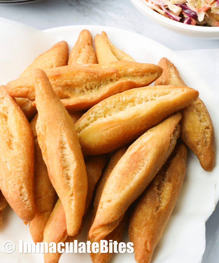 Jamaican Fried Dumplings (festivals) with mango coleslaw