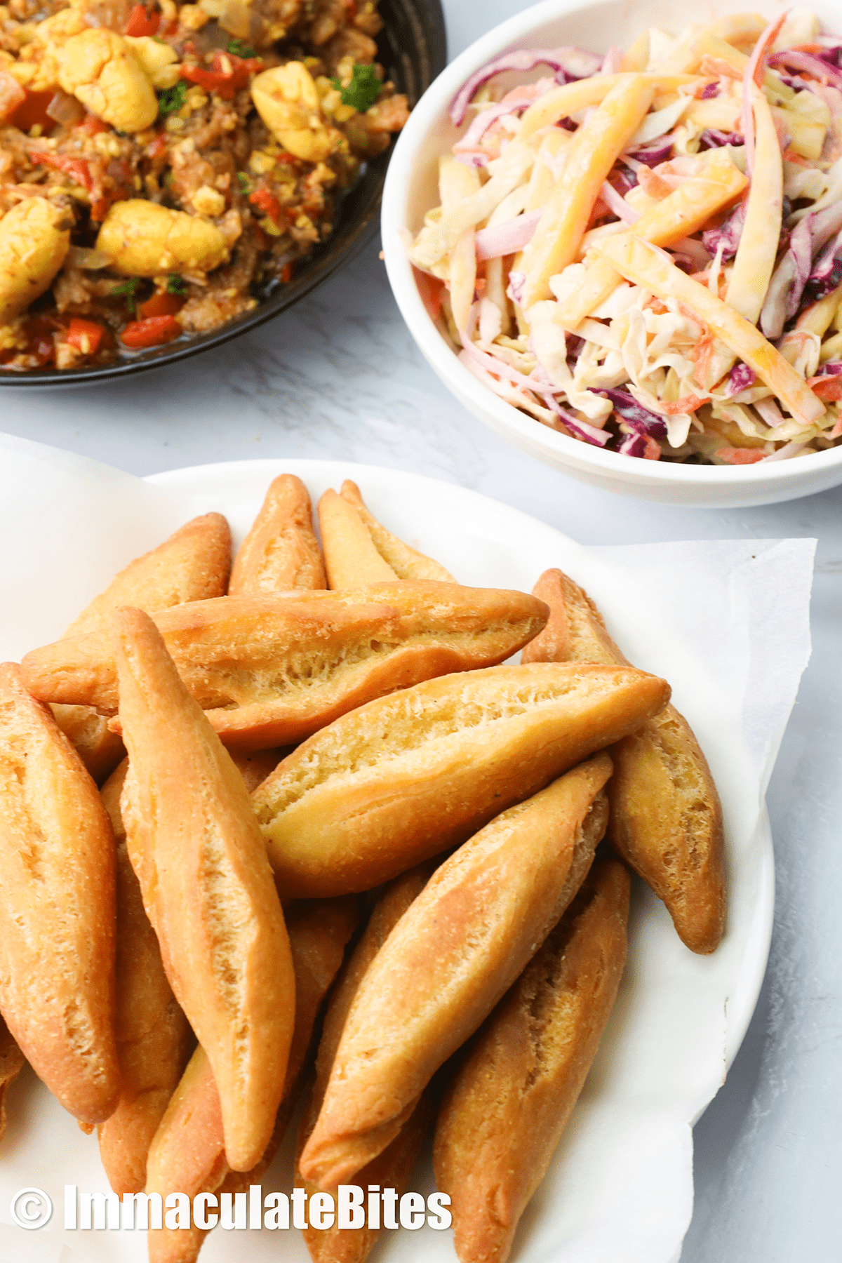 Jamaican Fried Dumpkin (Festival) and Mango Colle Slaw