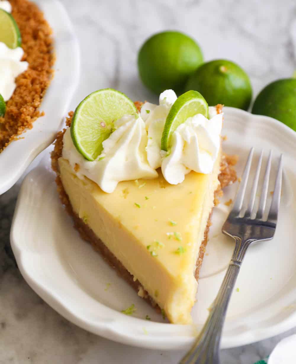 A serving of key lime pie with a fork