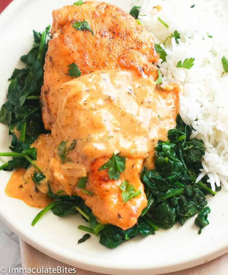 Florentine chicken with rice on a white plate