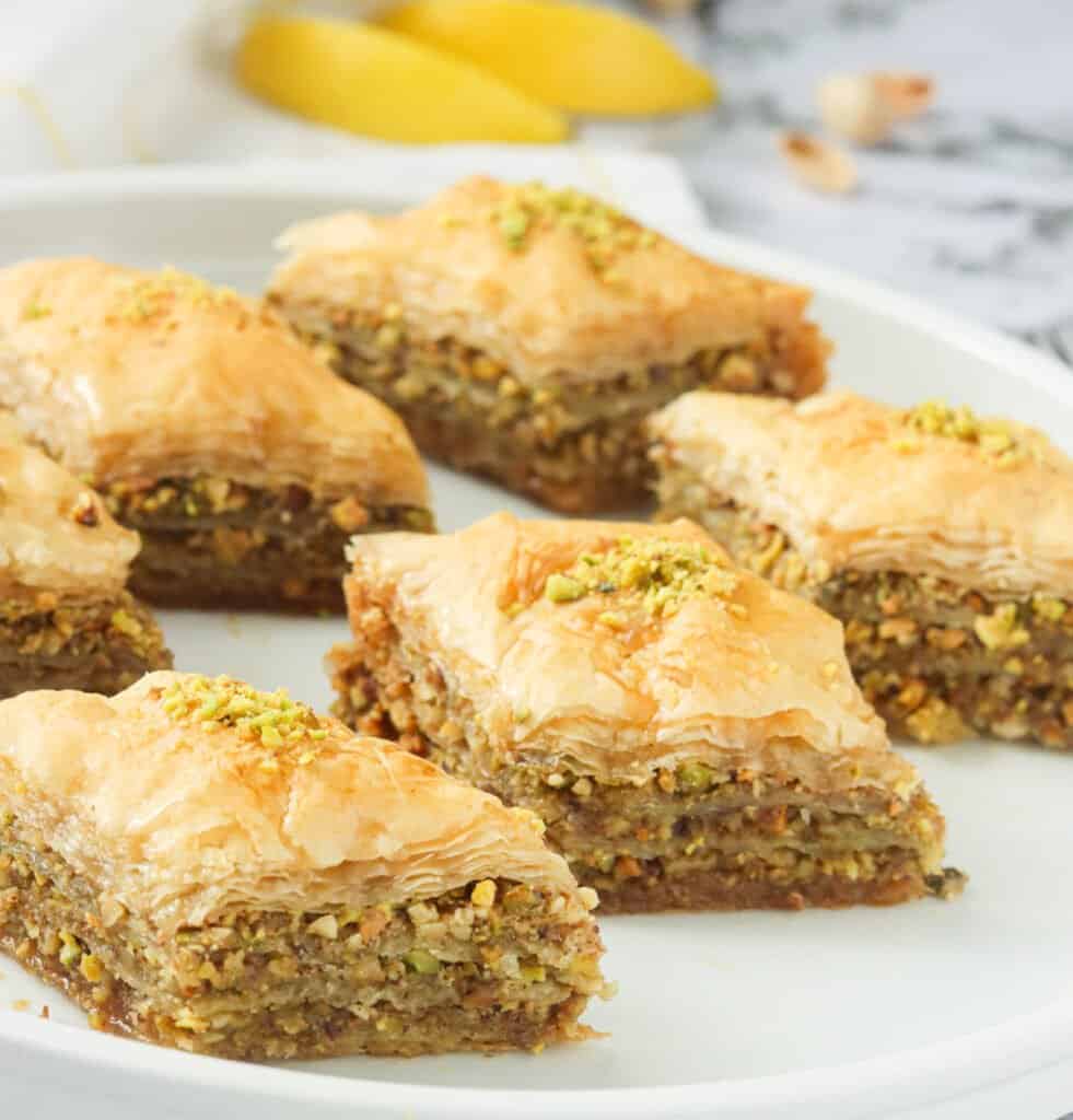 Baklava squares on a white plate