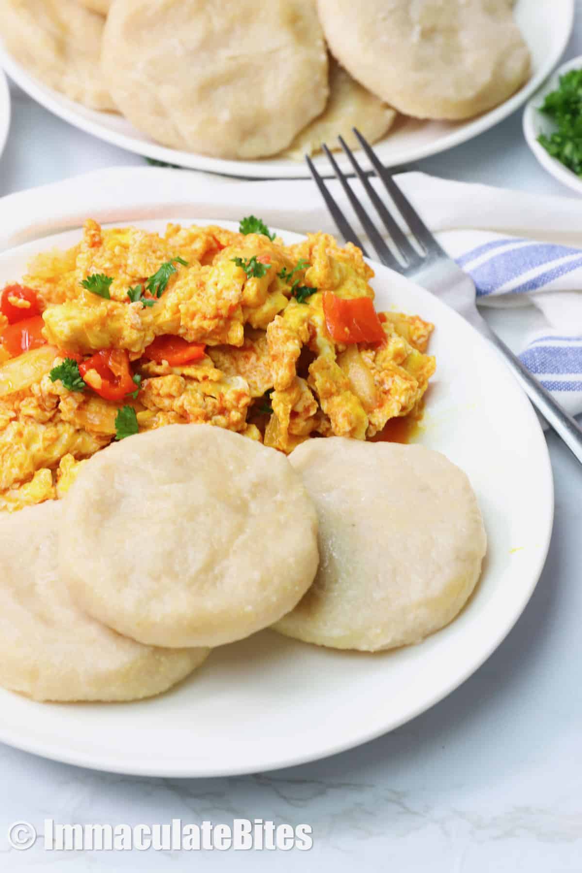 Ackee and saltfish with three Caribbean boiled dumplings