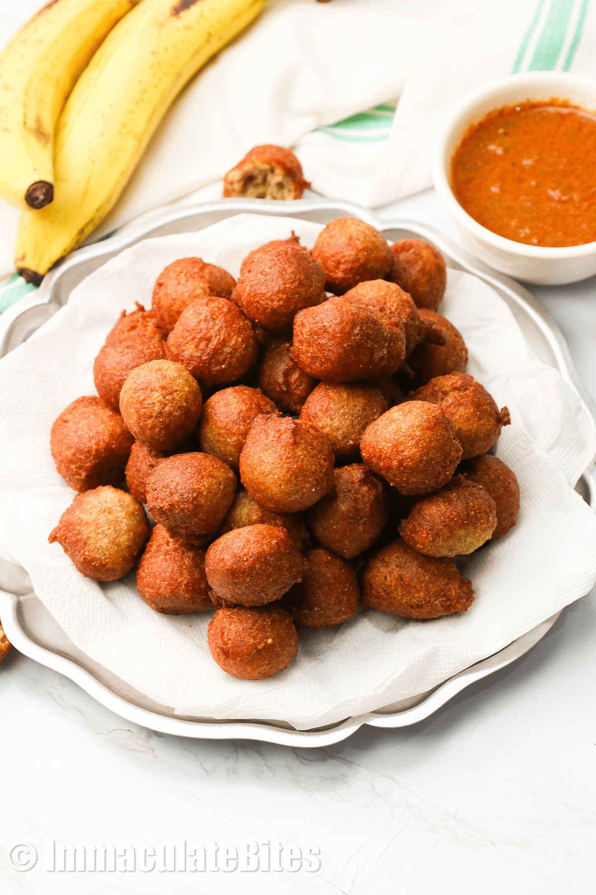 Banana fritters with fresh bananas and delicious sauce