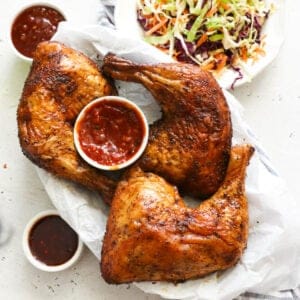 Smoked chicken leg quarters with dipping sauce