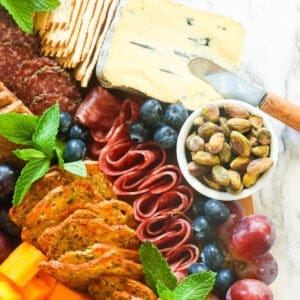 Closeup on charcuterie board with pistachios