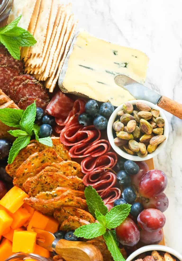 Closeup on charcuterie board with pistachios