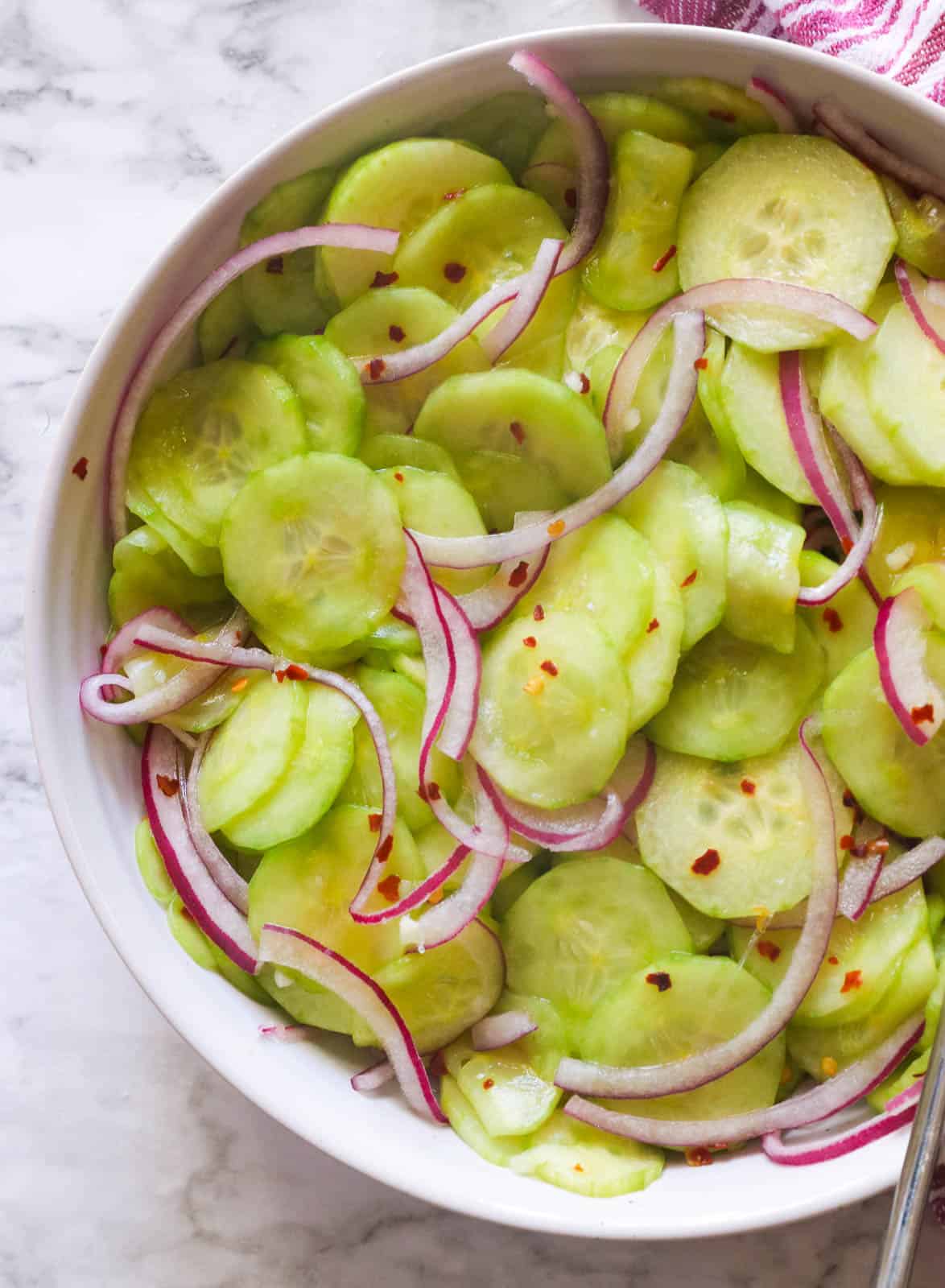 Refreshing Cucumber and onion salad with red pepper flakes
