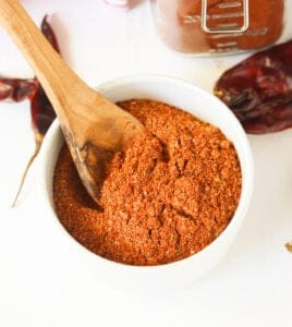 Homemade chili powder in a white bowl