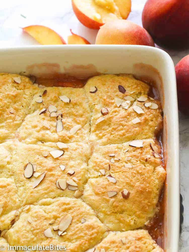 A whole peach cobbler fresh from the oven for a classic Southern dessert