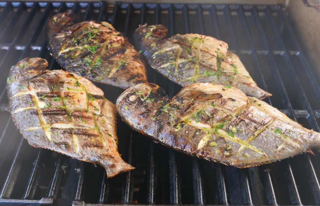 Pompano ready to take off the grill