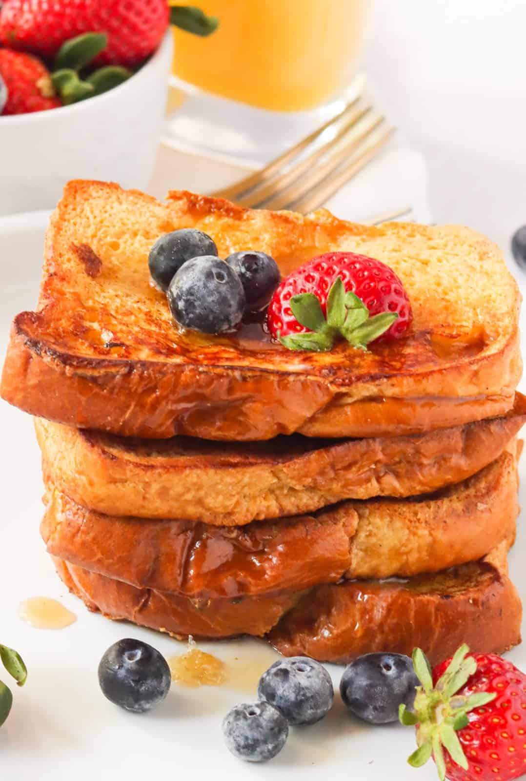 Breakfast is brioche French toast topped with fresh fruit.