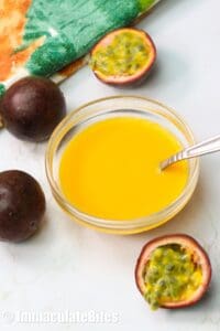 Passion fruit puree in a bow with a spoon