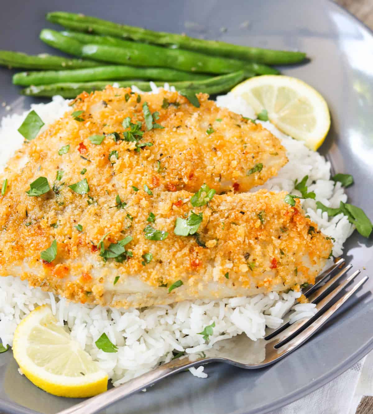 Delicious Parmesan Crusted Tilapia with rice and green beans