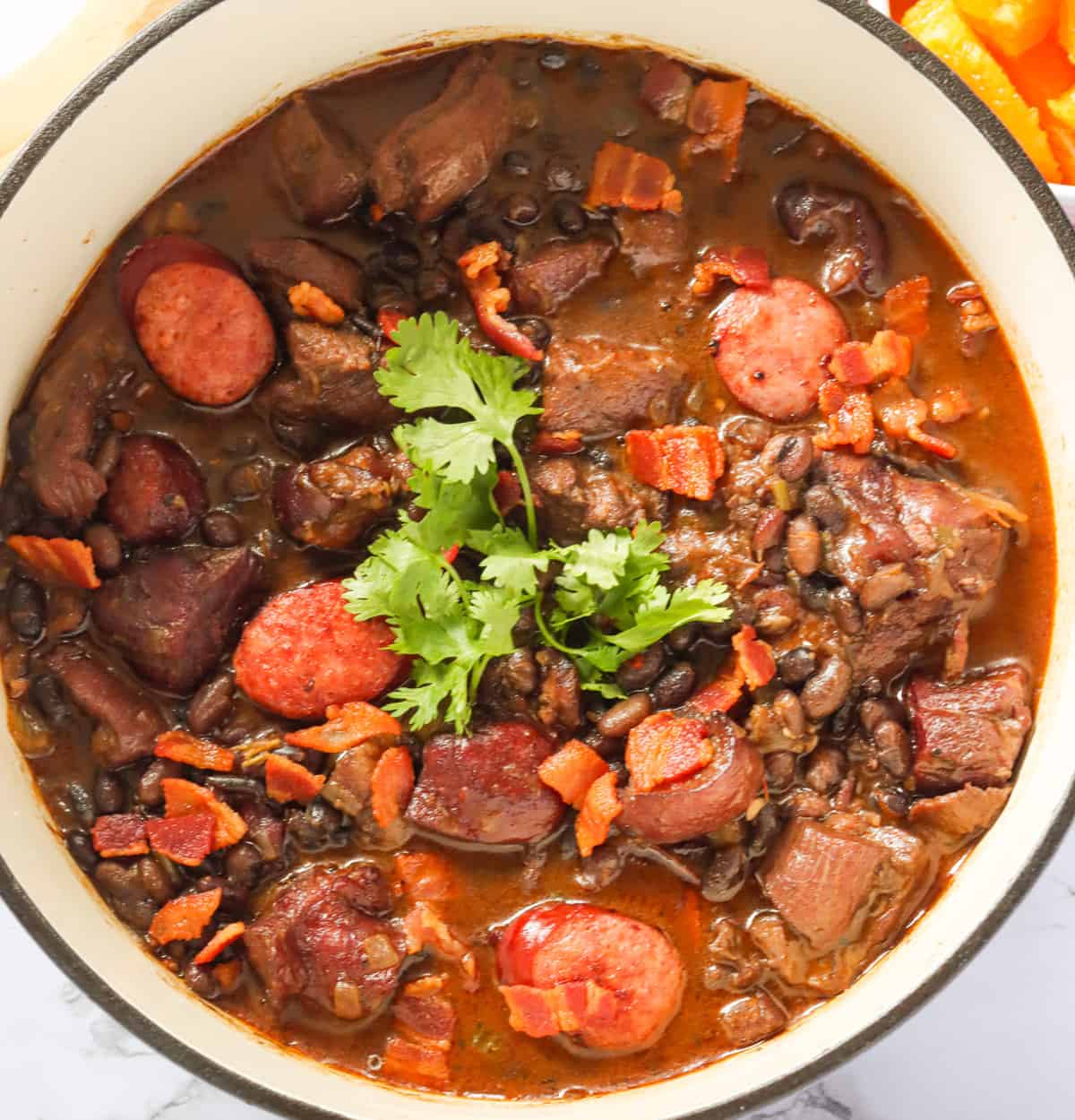 Pot of fresh feijoada with cilantro
