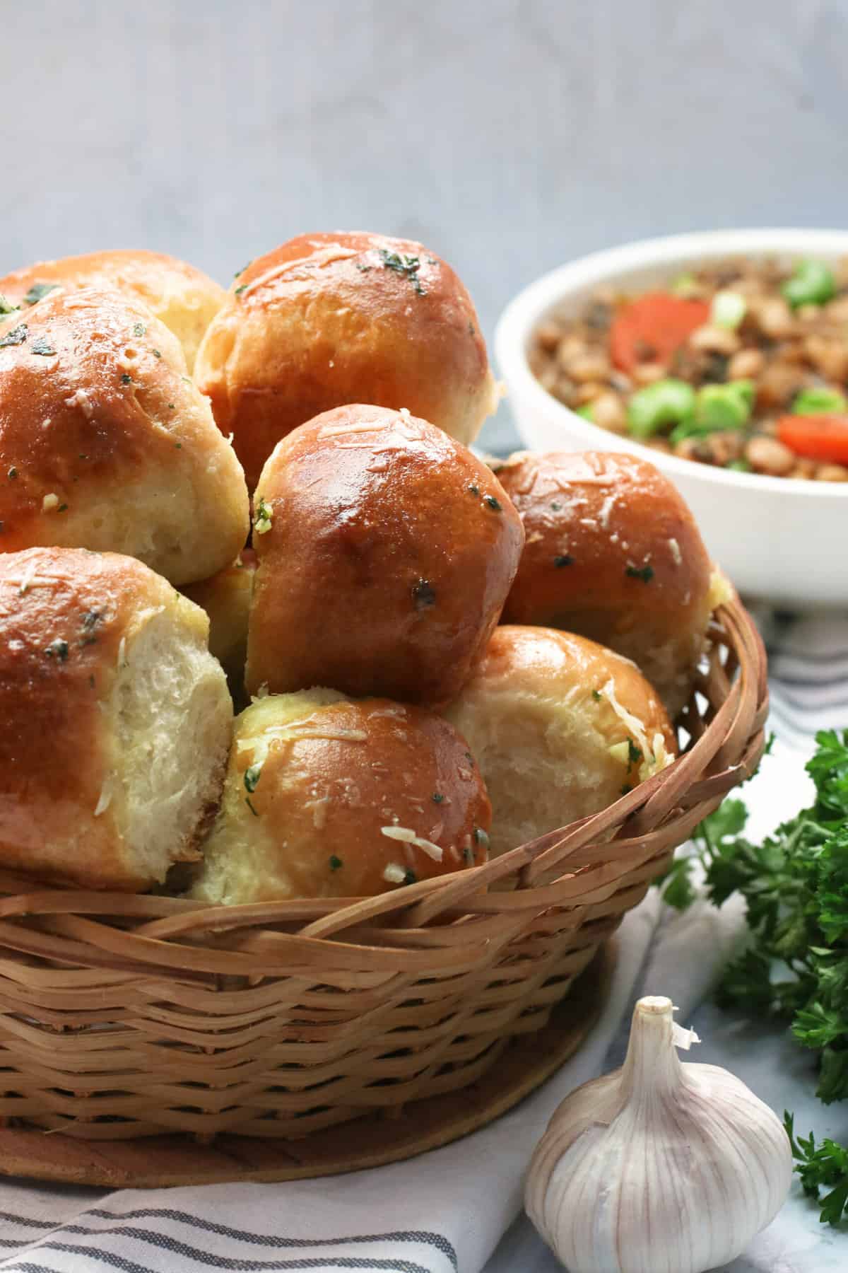 Delicious pull-apart garlic bread rolls in a basket