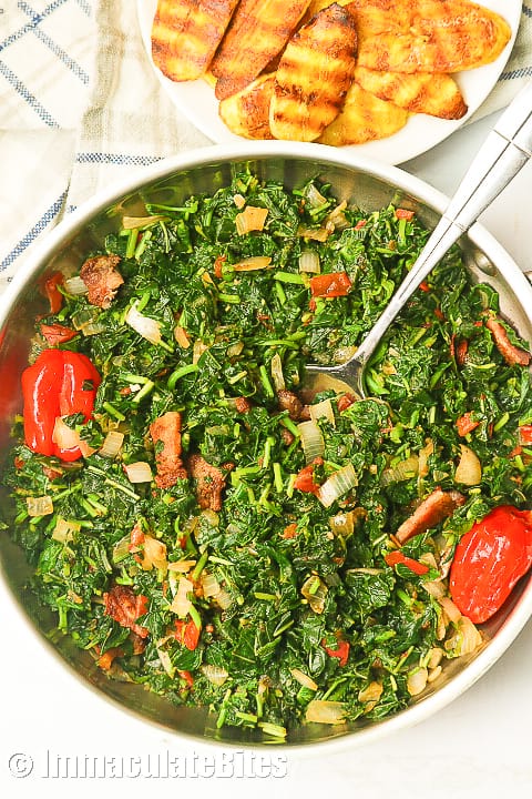 A bowl of freshly cooked callaloo ready to serve in a bowl